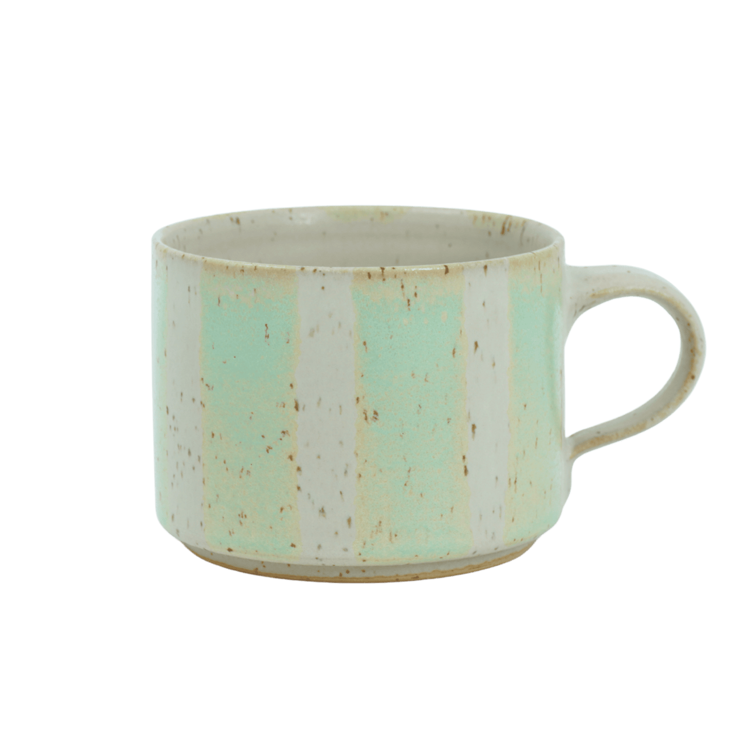 Bredrandig kopp i keramik med grön ränder mot ljus botten