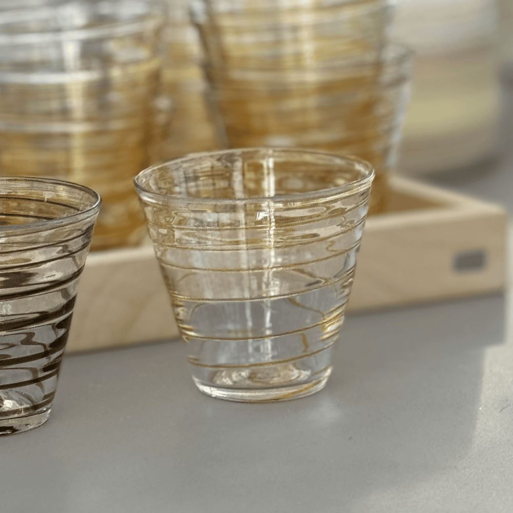 Glas litet rand ljus