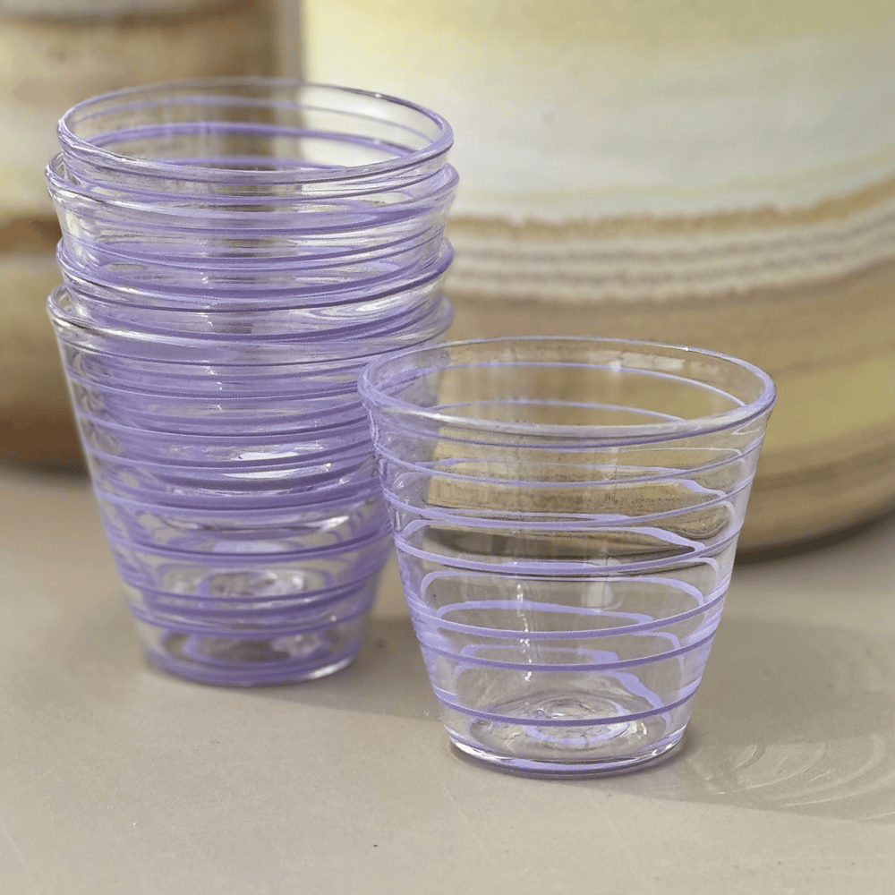 Glas litet rand blek lila